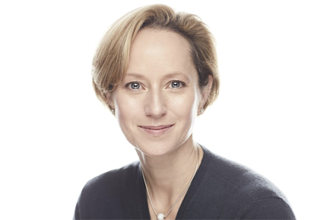 A drawing by a pre-k student of two hearts and a hand